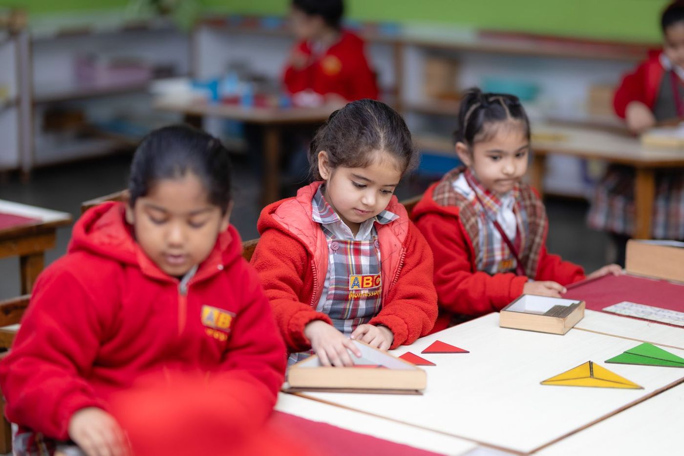 Young children learning together at a small-group table